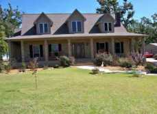 Elegant, Traditional Home that has EVERYTHING!!! 4 Bedrooms, 3 Baths, Kitchen with Breakfast Area, Dining Room, Living Room, Covered Front Porch, Screened-In Back Porch, Utility Room, Attached 2 Car Garage, Detached 30x30 Garage with 2-10' High Garage Doors, Bathroom and Heat/Air. Beautiful hardwood floors and lots of closets. A wonderful home in a quiet subdivision in the county yet close to town sitting on 3.76 ACRES. Call Kathy DeCoursey (270) 350-1382 or kathy@cadizrealty.com for more information. Coldwell Banker Service 1st Realty, Your Perfect Partner.
